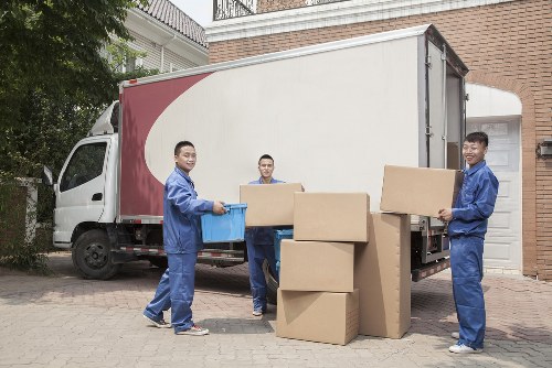 Removal company staff reviewing ethical compliance documents