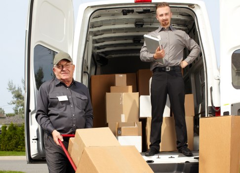 Urgent same day removals truck in Newham city street