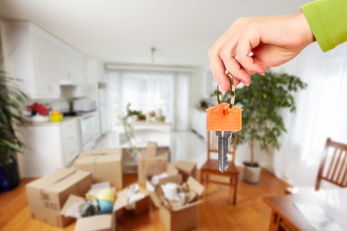 Flat removals planning in Newham with moving boxes and apartment access