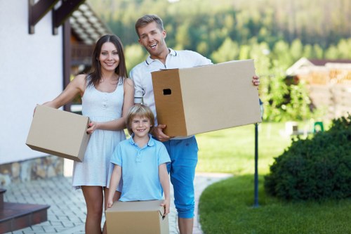 Newham removals professionals managing furniture for a local move