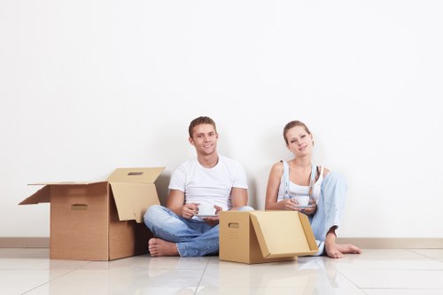 Packed moving boxes ready for same day removals in Newham home