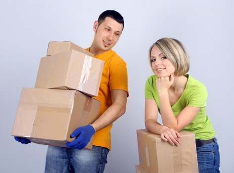 Professional crew loading office furniture in Newham