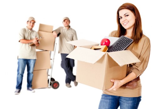 Organised storage unit in Newham with boxes and furniture