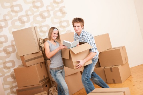 Efficient flat relocation service in Newham with furniture and boxes